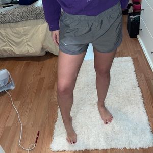 Grey Nike track shorts
